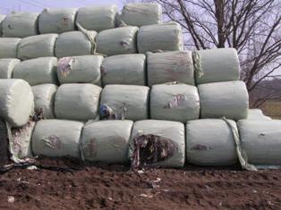 Hundreds of tonnes of household and business waste has been disguised as plastic-wrapped hay, straw or silage bales and dumped on farmland in Essex